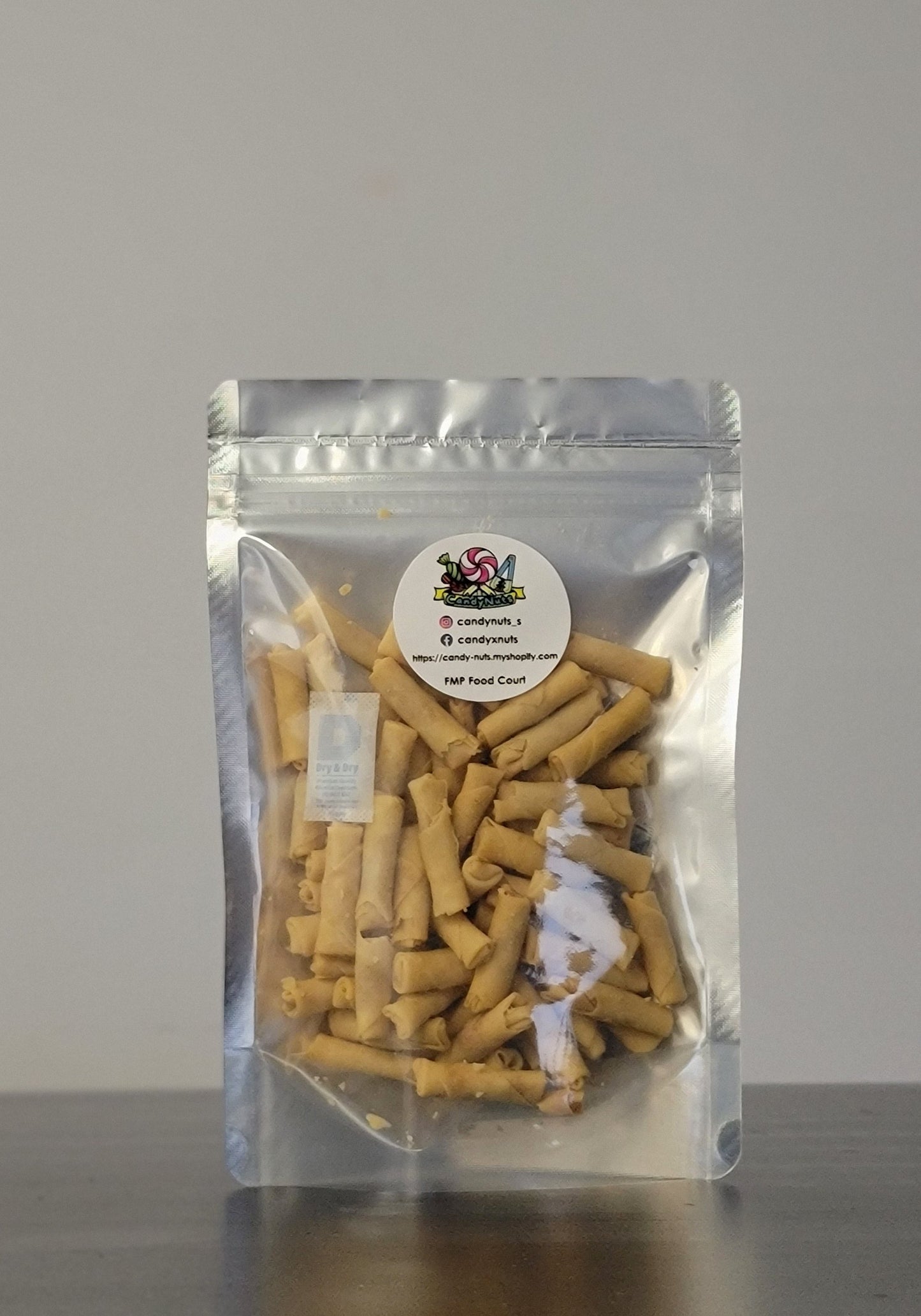 Crispy Shrimp Rolls 蝦米春卷 is a delicious snack that can be enjoyed on its own.