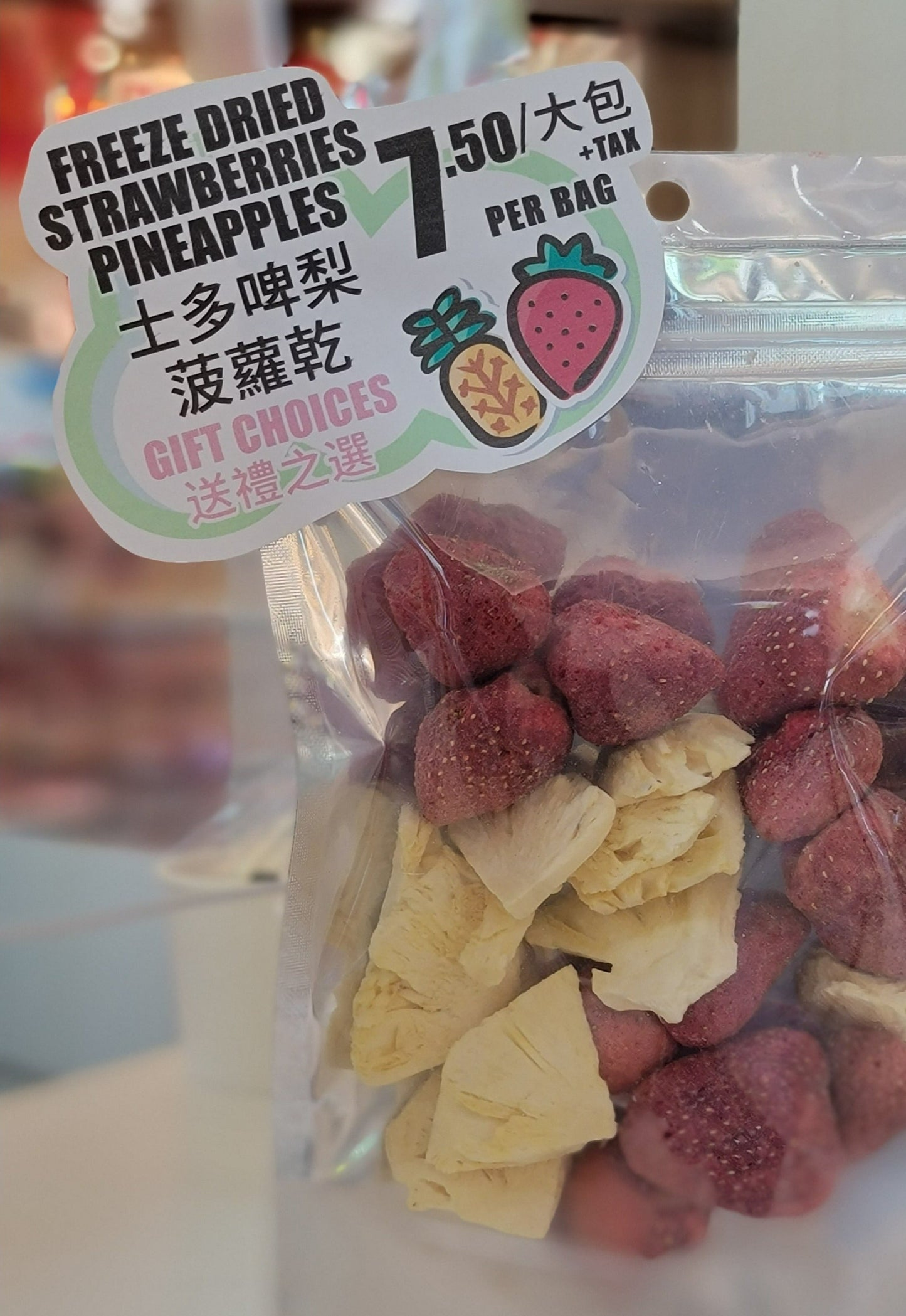 Freeze Dried Whole Strawberries (light cane sugar) &amp; Pineapples without added sugar.